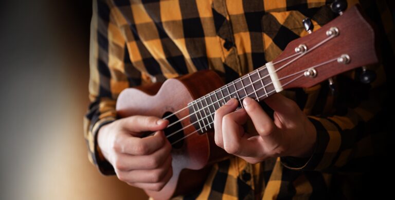 Which is easier to learn guitar or ukulele
